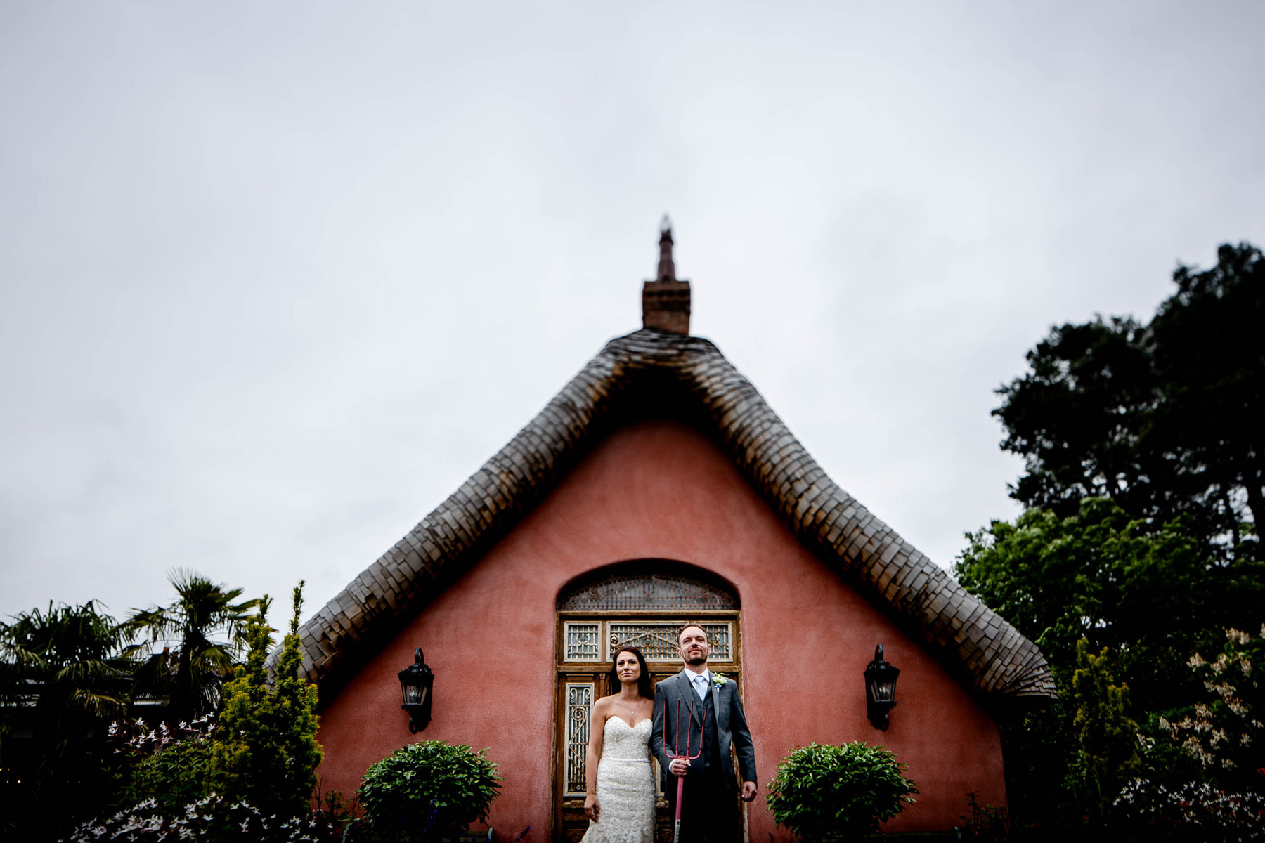 Grant woods American gothic as a wedding photograph at le petit chateau wedding venue