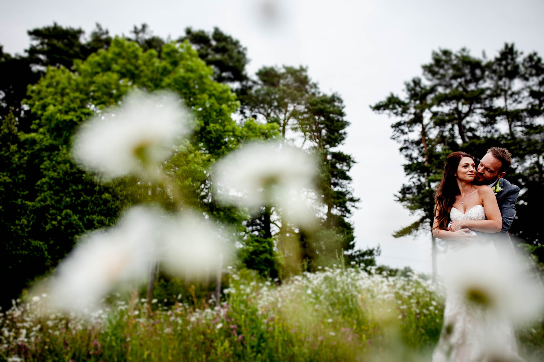 intimate couple portrait for a wedding at le petit chateau - taken in the meadowfield