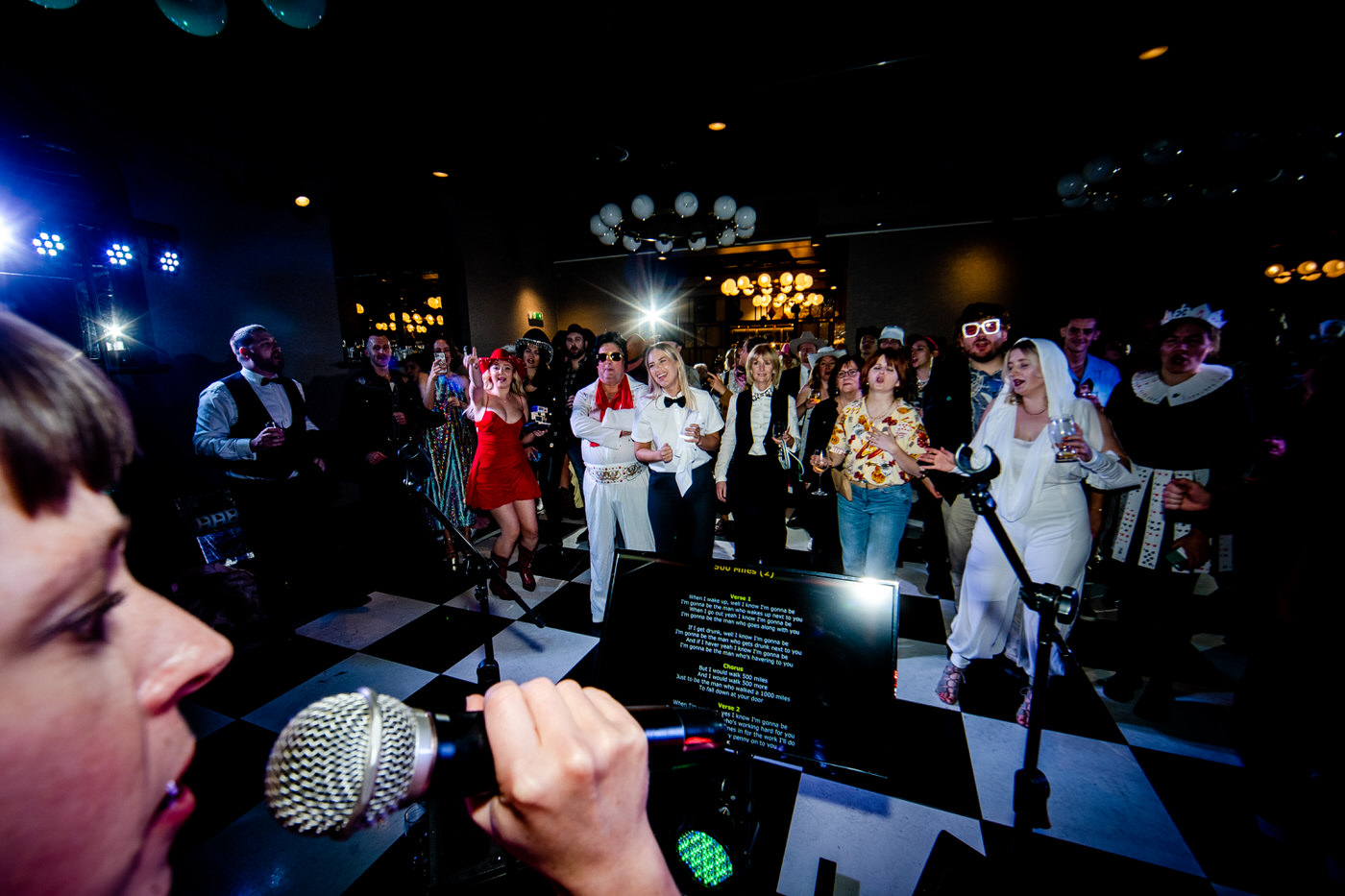 Guests singing and dancing on a packed wedding reception dance floor at a the avon gorge hotel wedding venue in Bristol, photographed by Gavin Jacob Power.