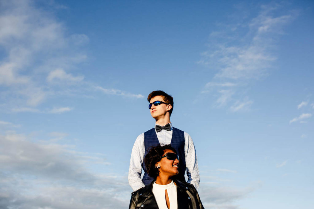 wild and free bride and groom in sunglasses and leather jacket at hidden river cabins wedding