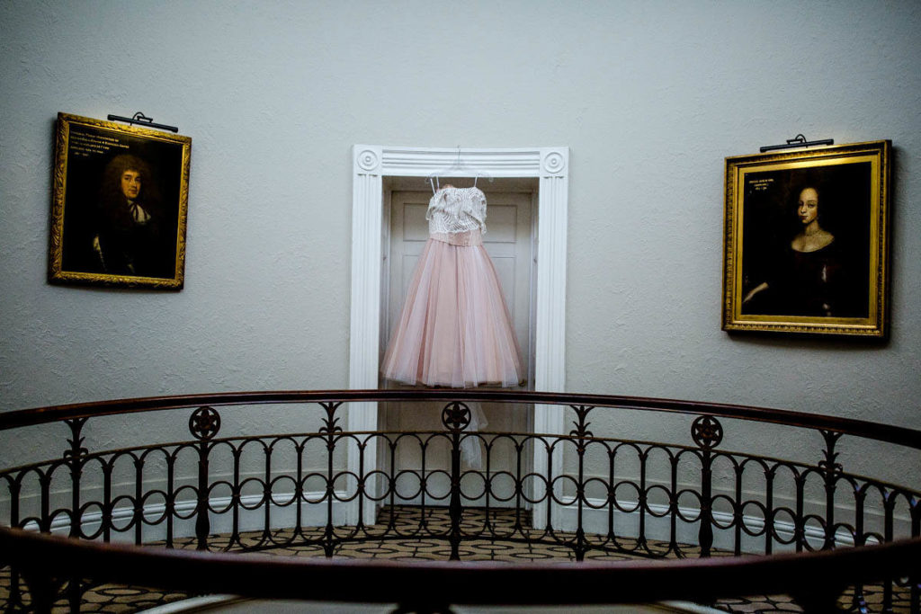 Wedding Dress hanging in the hallway of Storrs Hall