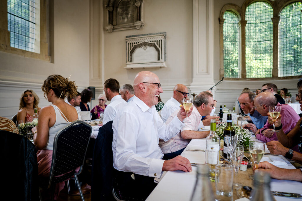 guests laughing during the wedding breakfast at arnos vale