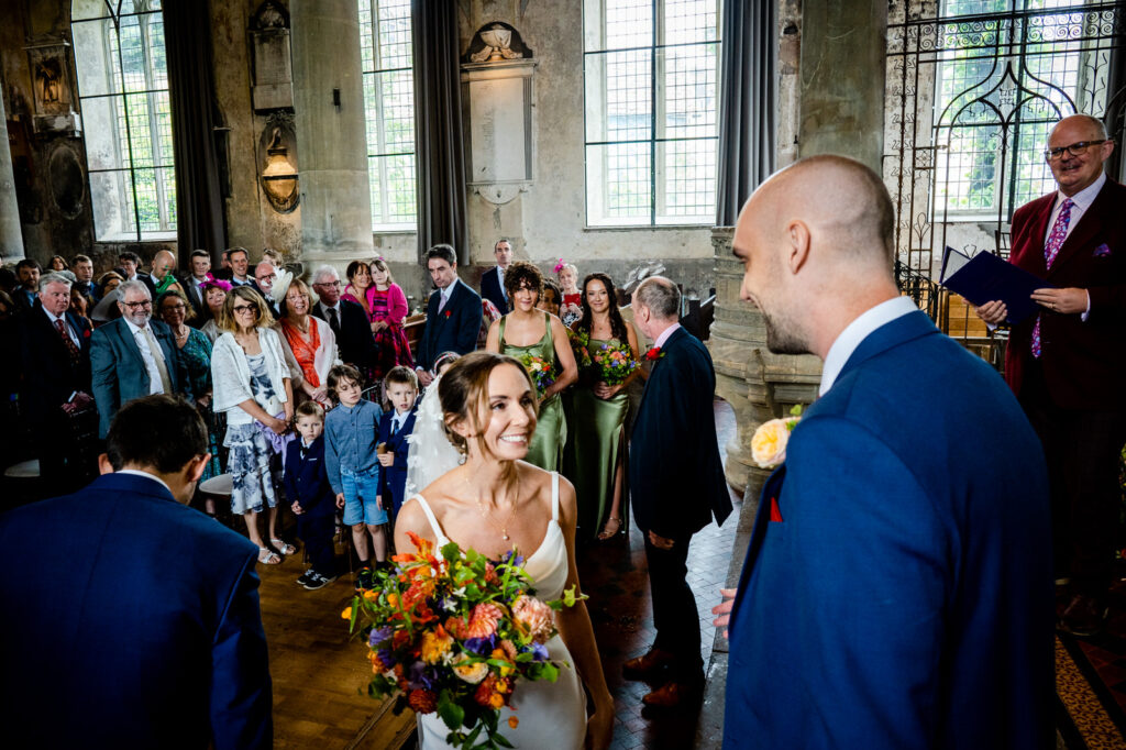 bride and groom first see each other in a photographs from their mount without wedding